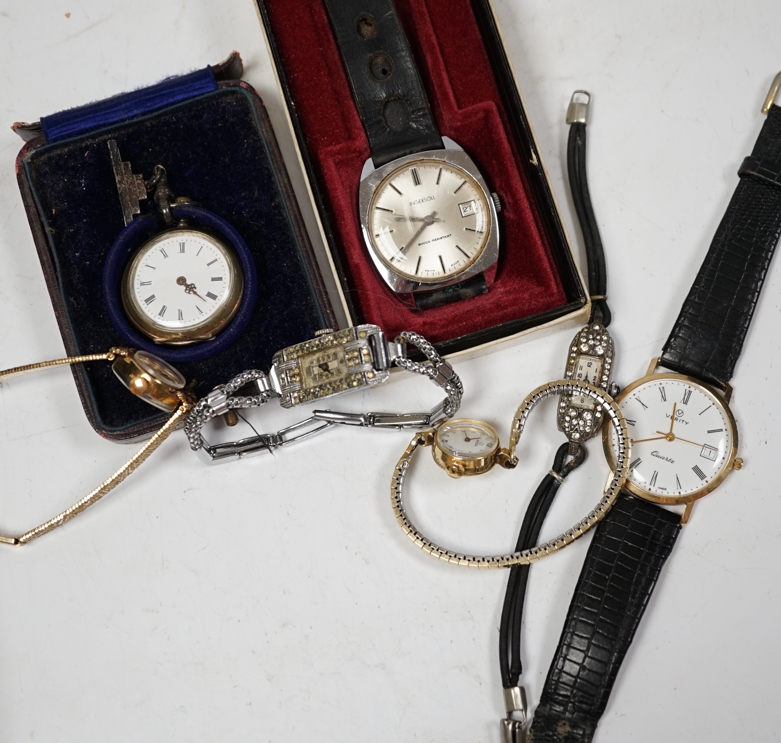 A small group of assorted wrist watches, a Rolex watch movement and a silver pocket watch with other items